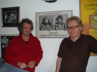 Andy Irvine and Paul Brady in front of thier 1976 concert poster 2008