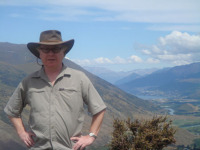 Bushman Brady at the top of the pass overlooking Queenstown NZ